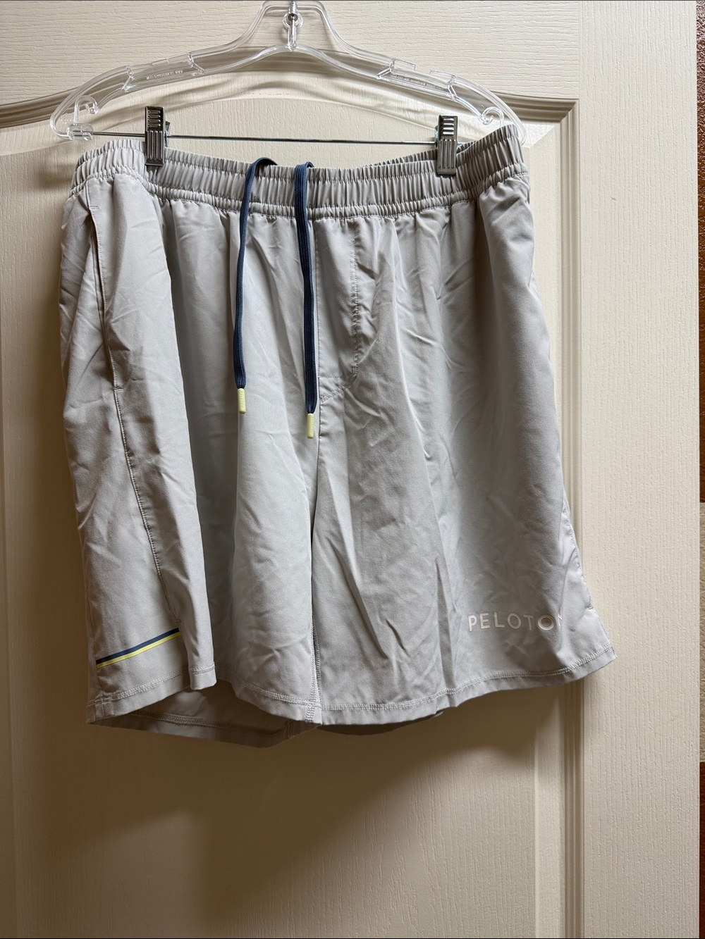 Peloton Light Gray Athletic Shorts with Navy Drawstring and Neon Accents